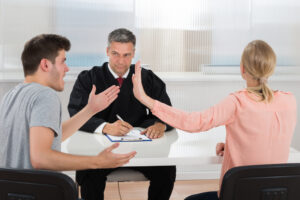 clients fighting in front of a judge