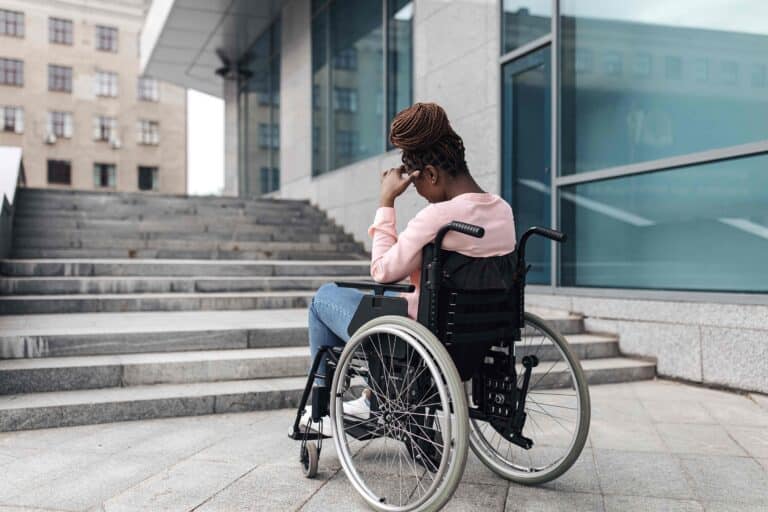 Person with a catastrophic injury at home with a family member